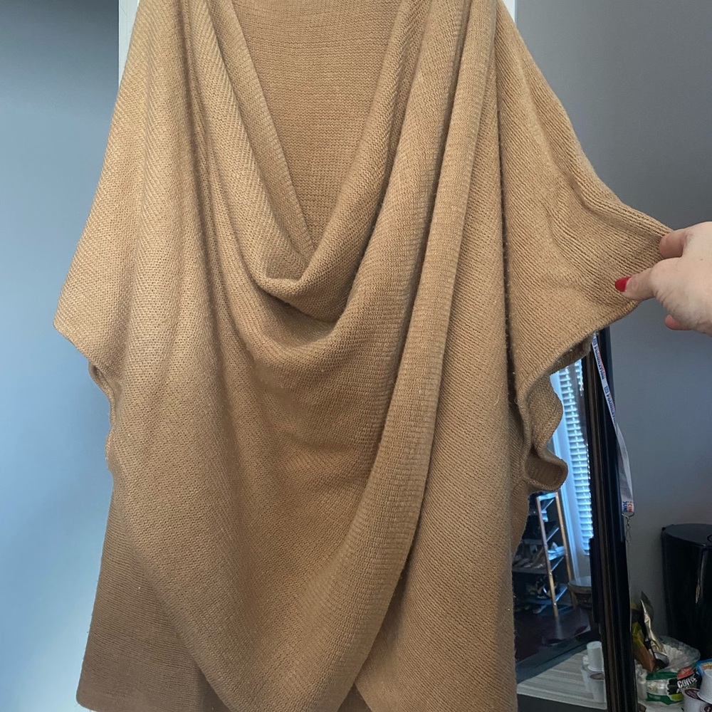 Gorgeous super soft sweater/poncho! One size fits all. Looks great dressed up/dn